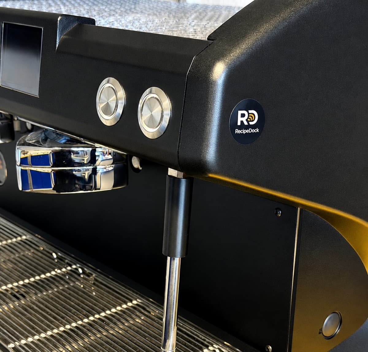 RecipeDock NFC tag attached to professional Reneka espresso equipment